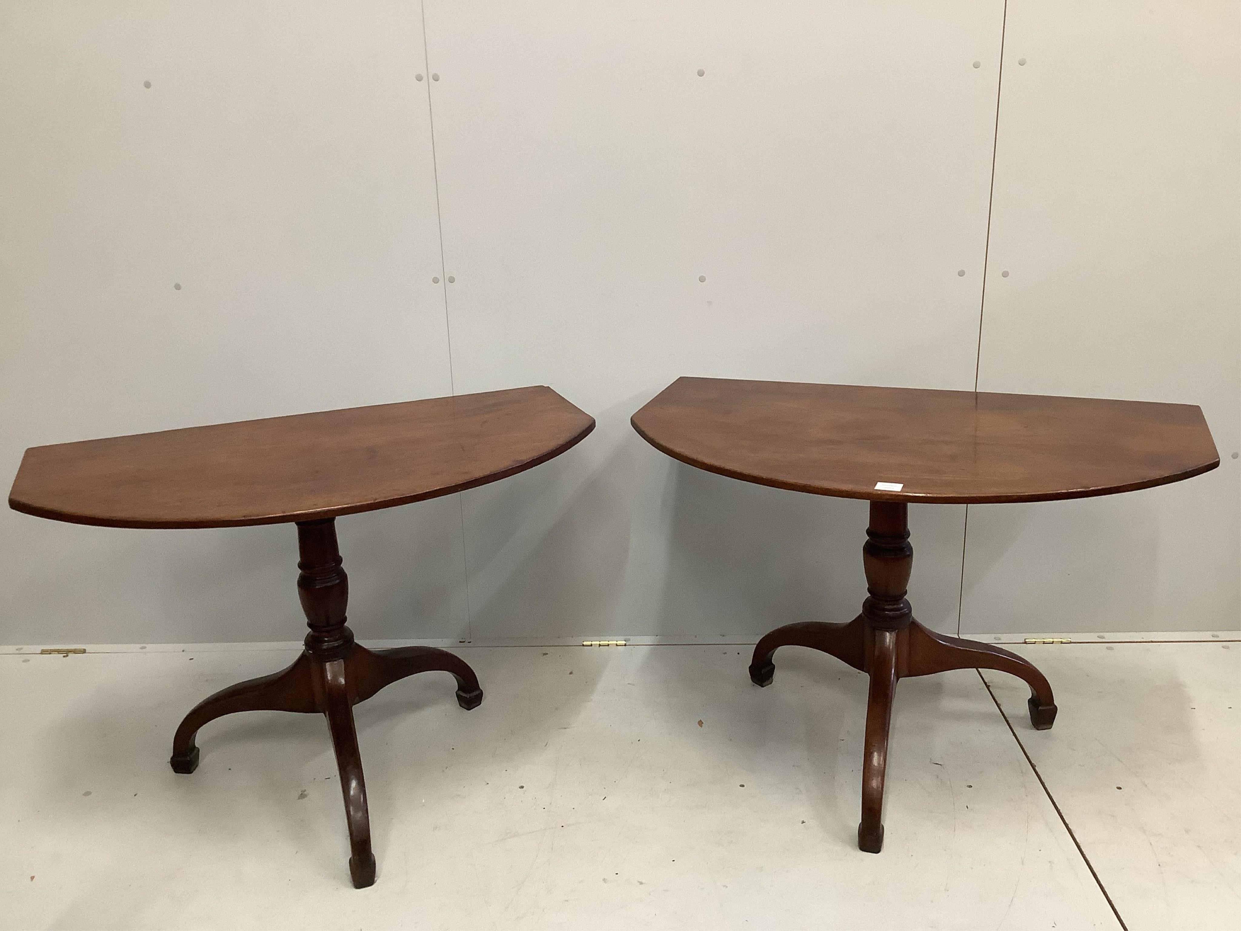 A George III mahogany two pillar dining table, no spare leaf, width 206cm, depth 59cm, height 70cm. Condition - fair